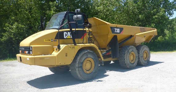 big ticket transportation 2014 Caterpillar 730 6x6 articulated dump truck sold by Ritchie Bros. Auctioneers
